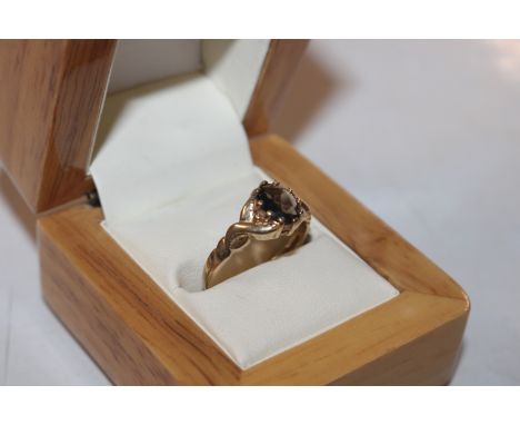 A Hallmarked 9ct gold smoky topaz ring with Celtic detail to the shoulders, ring size P/Q, approx. 1.8gms