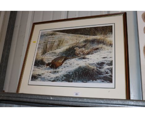 A pencil signed limited edition print of pheasants in the snow 