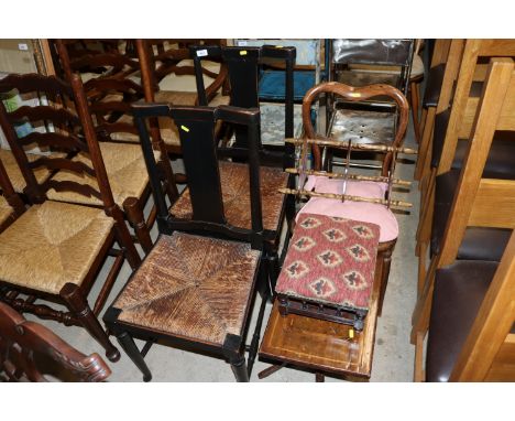 A pair of early 20th Century rush seated dining chairs; a Victorian rosewood bedroom chair; a corner shelf; upholstered foots