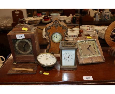 A brass cased carriage timepiece; a 19th Century walnut cased mantel timepiece; two others AF and a clock movement 