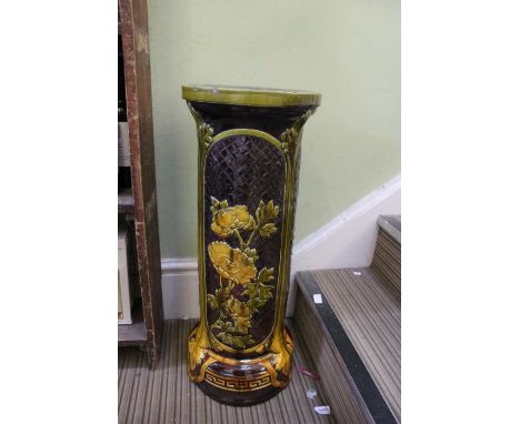A Bretby late 19th century Majolica floral decorated pedestal for a planter