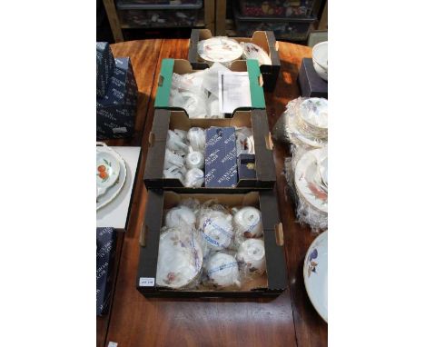 Four boxes containing a selection of unused Royal Worcester Evesham tea &amp; coffee wares