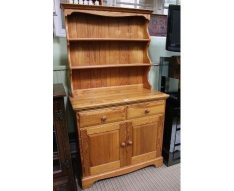 An Ercol small sized pine dresser unit