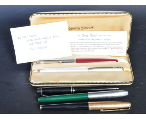 A collection of vintage 20th century fountain pens to include a boxed Conway Stuart fountain pen with 14ct gold nib, The De L