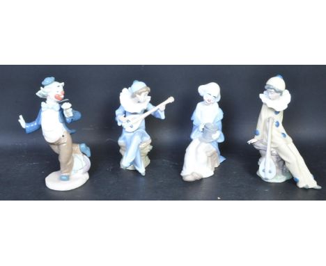 A collection of four vintage 20th century Nao Spanish porcelain clown Pierrot figures to include Little Clown in Love, Strumm