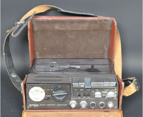 Uher - A vintage retro 20th century German Uher Munchen 4000 Report Moniter reel reel cassette player. Within original leathe