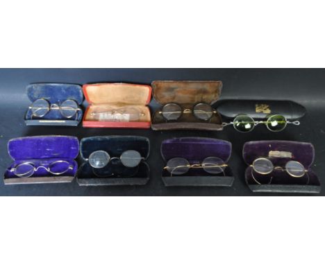 A collection of vintage cases reading spectacles/glasses. With yellow metal frame work. Some cases read 'The Adrian Grey opti
