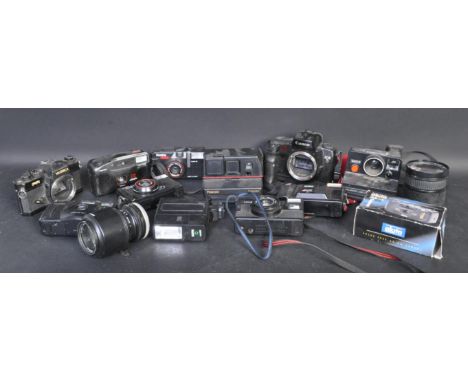 A collection of vintage 20th century camera equipment comprising of a Canon EOS5, Tamron 52mm lens, Yashica FR, Sigma 28-70mm