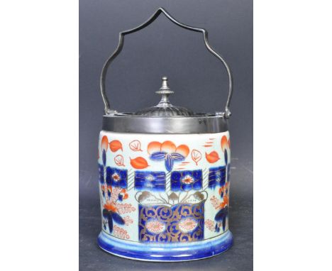 A vintage 20th century Chinese Imari manner biscuit barrel having floral gilt ceramic body with metal lid and handle. Marked 