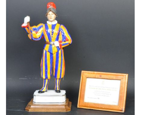 A vintage 20th century Royal Worcester china Trooper of the Papal Swiss Guard. Modelled by F. M. Gertner. Model no. 96. Measu