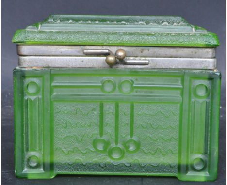 An early 20th century century Russian Maltsev green glass dresser casket / trinket box having a raised lid with geometric pat