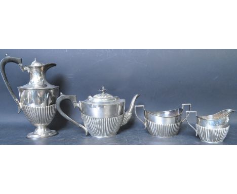 An early 20th century Barker Brothers silver plate tea service comprising of teapot, coffee pot, sugar bowl sucriere and milk