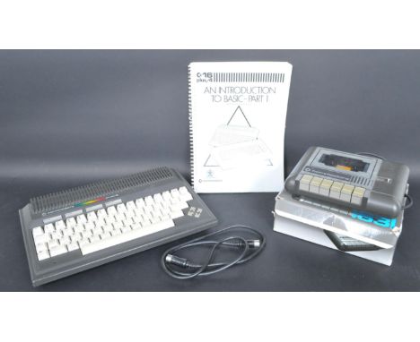 A set of retro vintage late 20th century Commodore Plus/4 computer keyboard and Datassette 1531 storage medium. The lot to in