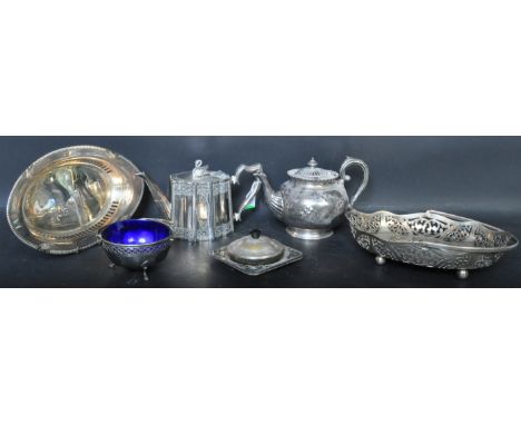 A collection of vintage silver plate, including teapots with a swan atop, pierced serving dishes/plates, lidded items and a c