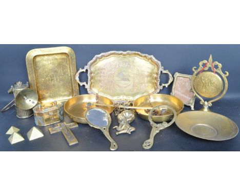 A large collection of 20th century brass items to include Art Nouveau style photo frames, a cherub wall pocket, wall mounted 