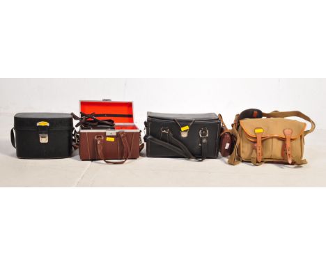 A large collection of vintage 20th century camera bags to include leather examples, canvas examples as well as soft and hard 