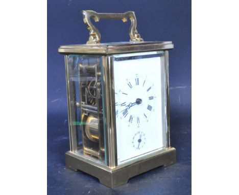A 20th century repeating carriage clock inscribed 'L'Epee Fondee en 1839 Sainte Suzanne France. The carriage clock having a b