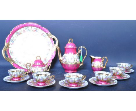 A retro vintage 20th Century JKW decor Carlsbad&nbsp;tea service. The tea set having gilt geometric pattern, depicting a coup