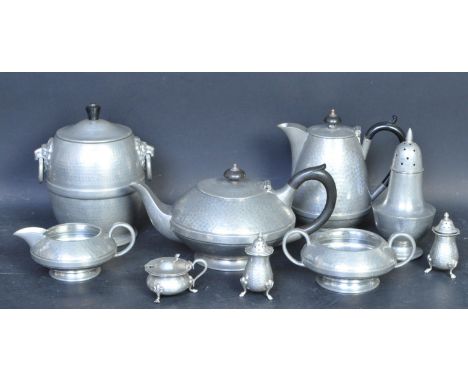 A collection of vintage mid 20th Century hammered pewter table ware / tea service. The lot to include tea pot, hot water pot,