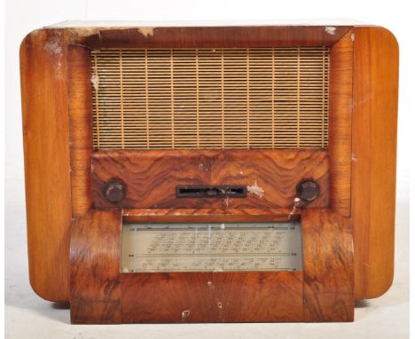 A retro vintage mid 20th century 1950s HMV (His Masters Voice) teak cased valve radio having HMV decal and burr walnut facade