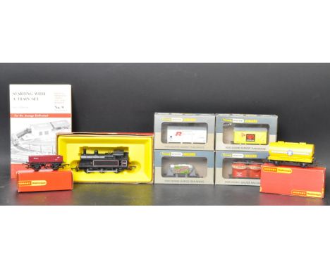 A collection of vintage 20th century Railway related toys comprising of a Triang Wrenin wagons, Hornby Railway locomotives, H