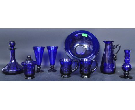 A collection of vintage late 20th century Thomas Webb, Stourbridge, Bristol Blue Glass items. The lot to include two glass ta