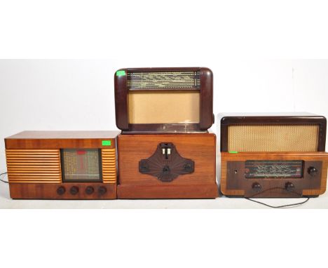 A collection of retro vintage mid 20th century circa 1940s &amp; 1950s valve radios each having wooden cases and bakelite dia