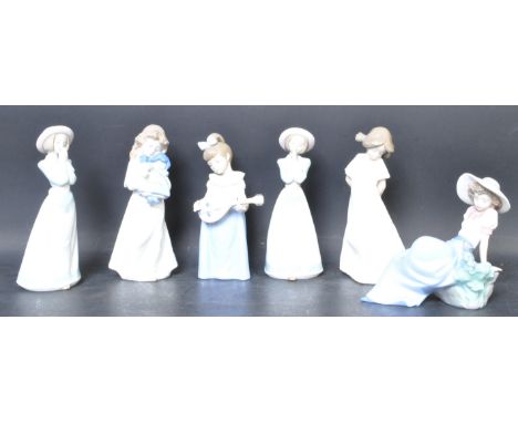 A collection of six Nao Spanish porcelain bone china figures to include Girl Listening to Bird Song, Girl With Mandolin, So S