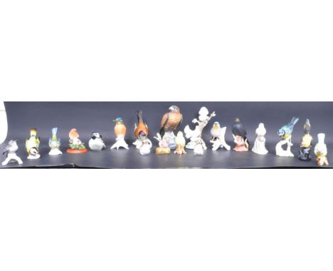 A collection of&nbsp; fine bone china and porcelain bird ornaments. To include; Karl Ens, Crown Staffordshire, Goebel and mor
