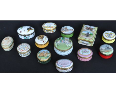 A collection of vintage 20th century ceramic pill boxed and trinket boxes. The lot to include 13 enamelled pill boxes of vari