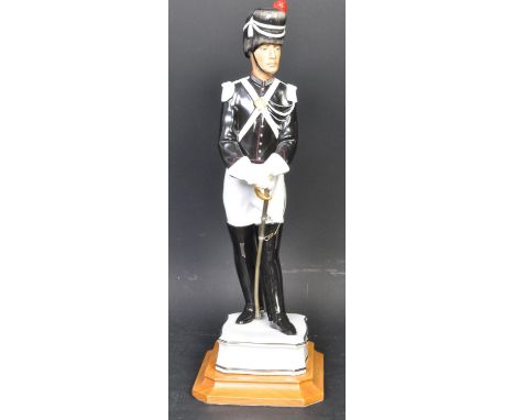 A vintage 20th century Royal Worcester Papal Gendarme as part of the Papal series. Modelled by Neal French. Measures 33cm tal