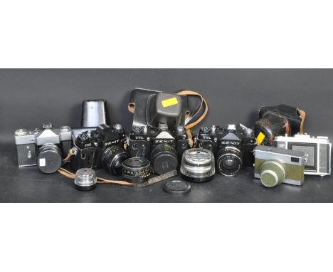 A collection of vintage 20th century photographic cameras and lenses to include a Zenit TTL with a Helios-44m-4 lens serial n