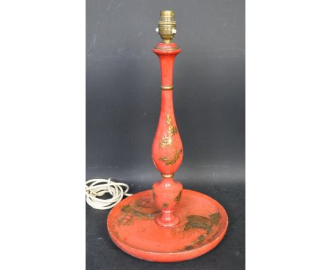A vintage 20th century Chinese Chinoiserie&nbsp;wooden table lamp having a large circular base with turned wood body and bein