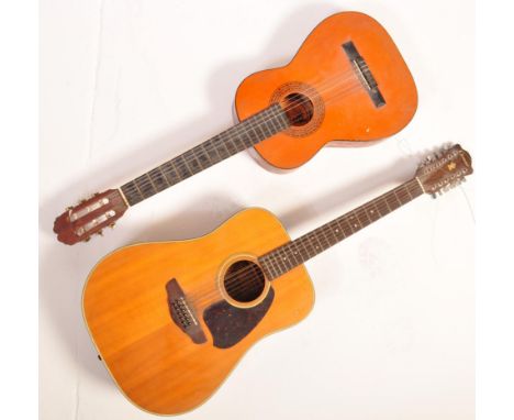 2 retro vintage Spanish acoustic guitars. 12 string Cimar guitar model number c 302 together with a BM clasico. Measures 107c