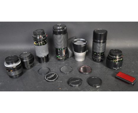 A collection of vintage 20th century camera lenses to include a Sigma Zoom-K II 1:4.5 F=70 210mm, a Canon Zoom Lens FD 70-210