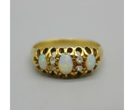 An 18ct gold, opal and diamond ring, 3.5g, P 