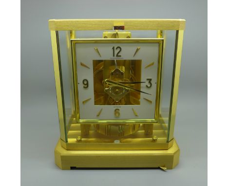 A Jaeger-LeCoultre atmos clock with guarantee and papers