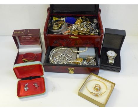 A jewellery cabinet with costume jewellery and two boxed wristwatches, Rotary and Avia 