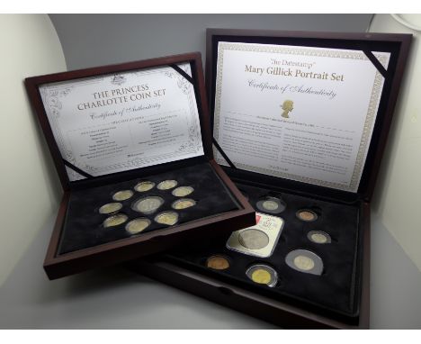 Two cases of coins; The Princess Charlotte Coin Set and Mary Gillick Portrait Set 