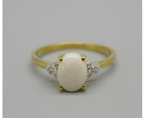 A 9ct gold, opal solitaire ring with diamond shoulders, 2g, P 