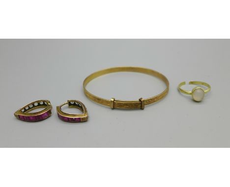 A '9ct metal core' bangle, a ring a/f, and a pair of earrings 