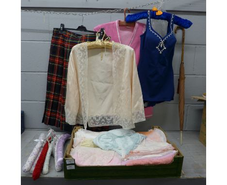 A collection of twenty-eight vintage petticoats, all with lace detail, a silk and lace bed jacket, also a vintage swimming co