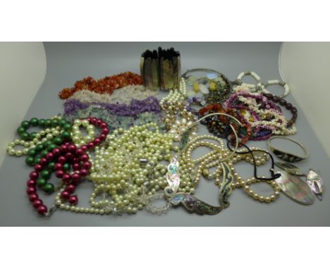 A collection of semi-precious stone jewellery, pearl jewellery and shell jewellery 