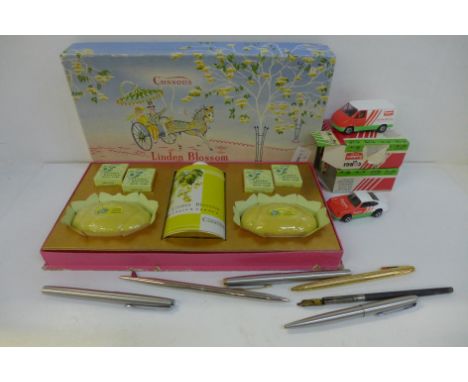 A vintage Cussons Linden Blossom bath set, boxed, four Corgi Batchelors Peas model lorries and a collection of pens 