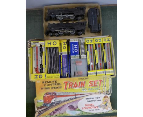 Two Marx model railway O gauge locomotives, one lacking tender, one loco incomplete and a Clifford Series battery operated HO