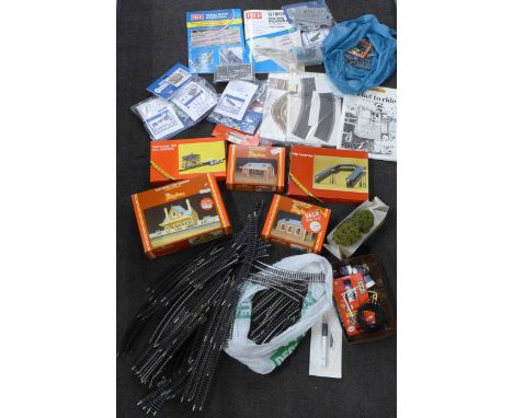 A collection of Hornby model buildings and track 
