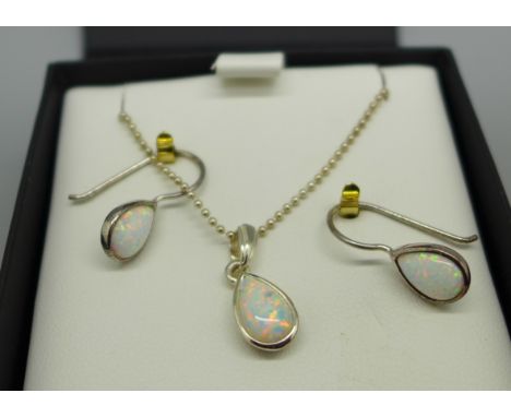 A silver and synthetic opal pendant and chain with matching earrings, with silver label, Von Treskow 