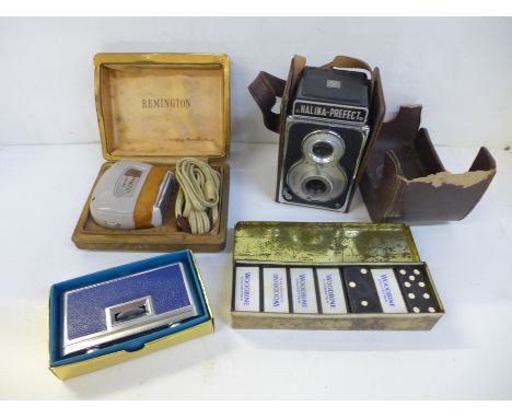 A vintage camera, a Woodbine cigarettes dominoes set, a Remington Super 60 shaver, opera glasses and a WWI Victory Medal to 2