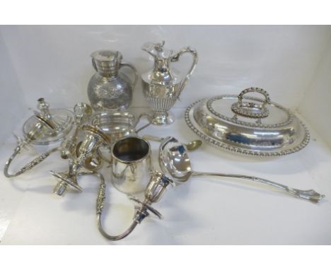 Mixed silver plated items, entree dish, ladle, candelabra, a/f, two wine jugs, etc. 