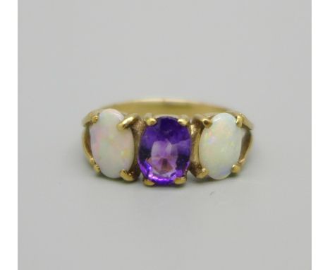 A 9ct gold, opal and amethyst ring, 1.9g, M 